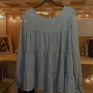 This is a blue long sleeved Shein top. Great condition. Comfortable and loose.
